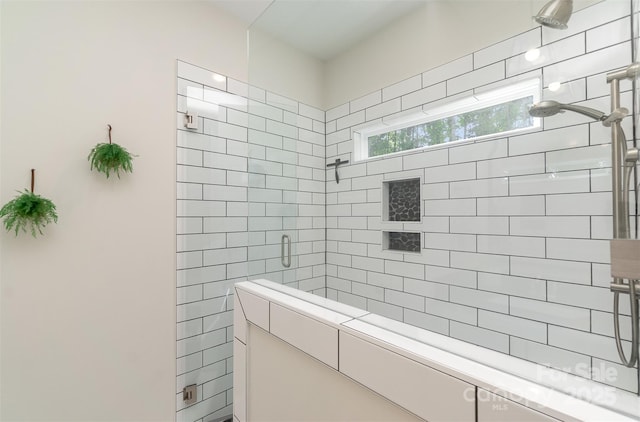 bathroom with a stall shower