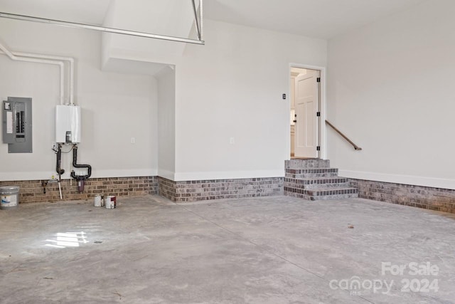 interior space featuring water heater and electric panel