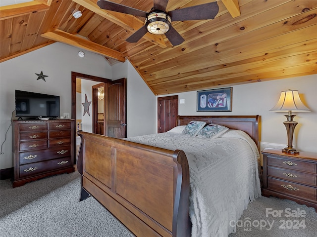 bedroom with ceiling fan, carpet, lofted ceiling with beams, and wooden ceiling