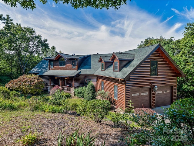 log home with a garage