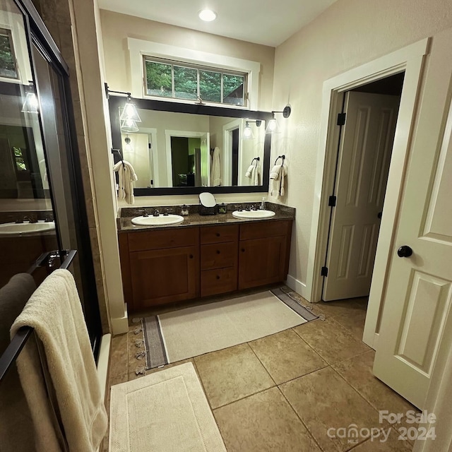 bathroom featuring vanity and tile patterned floors