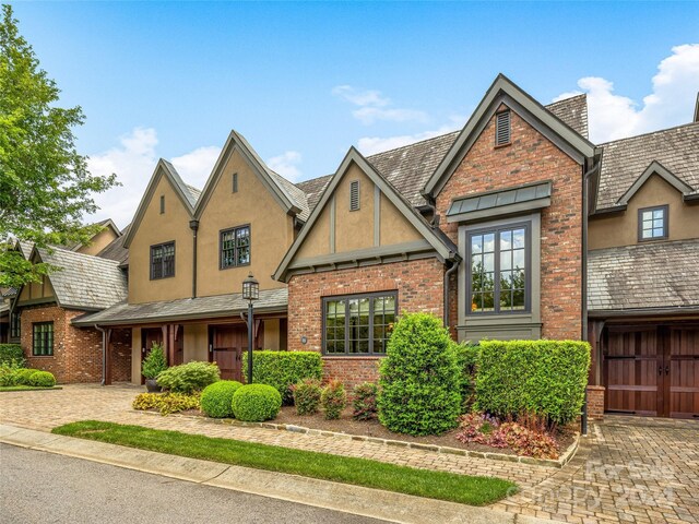 tudor house with a garage