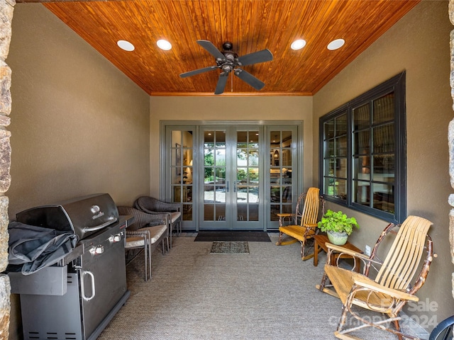 view of patio featuring ceiling fan, french doors, and a grill