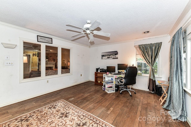 office featuring ceiling fan, a textured ceiling, crown molding, and dark hardwood / wood-style flooring