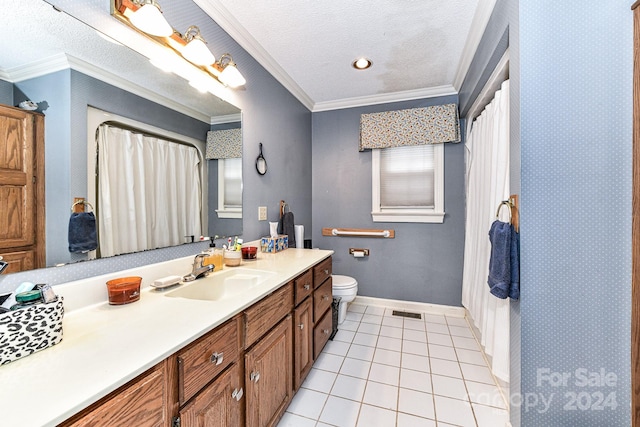 bathroom featuring vanity, tile patterned flooring, a textured ceiling, crown molding, and toilet