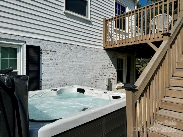 exterior space featuring a jacuzzi