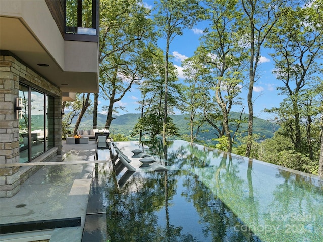 property view of water with a mountain view