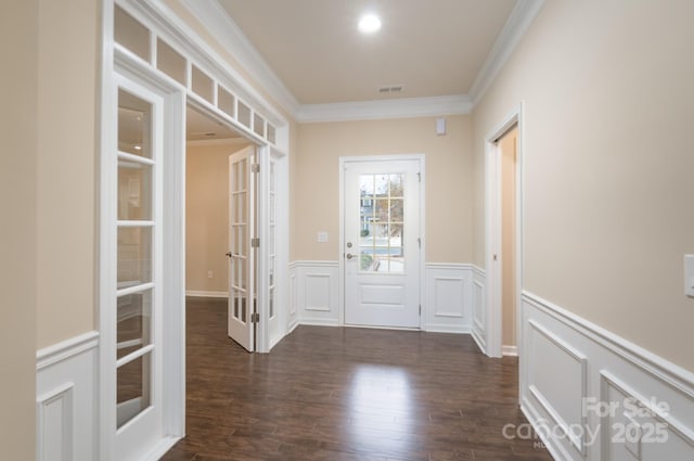 interior space featuring french doors, dark hardwood / wood-style flooring, and ornamental molding