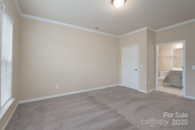 unfurnished bedroom with connected bathroom, light colored carpet, multiple windows, and ornamental molding