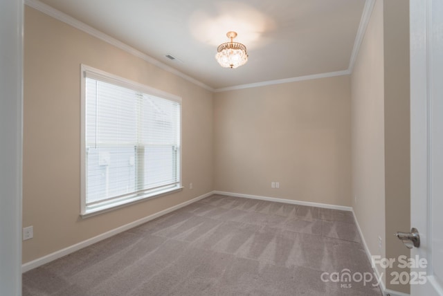 unfurnished room with light carpet, a chandelier, and crown molding