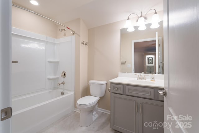 full bathroom with tile patterned floors, vanity, bathtub / shower combination, and toilet