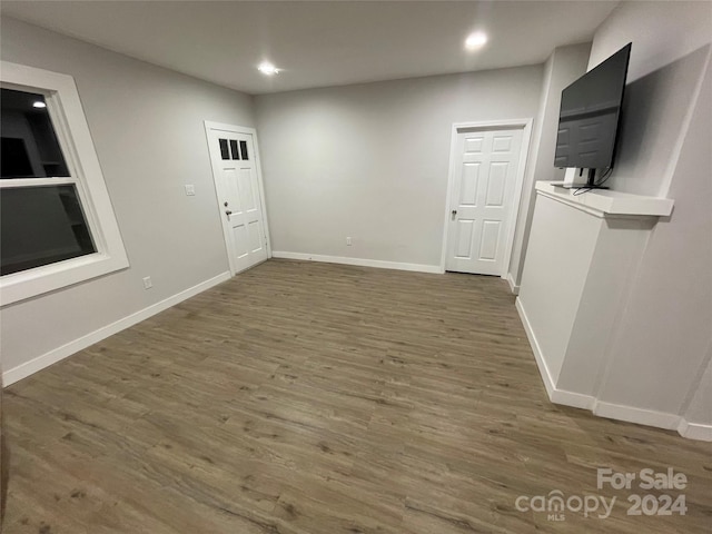 spare room featuring dark hardwood / wood-style floors