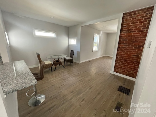 sitting room featuring dark hardwood / wood-style floors