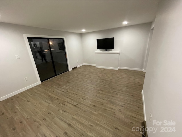 unfurnished living room with hardwood / wood-style floors