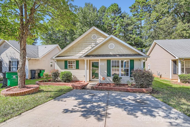 view of front of home with a front yard