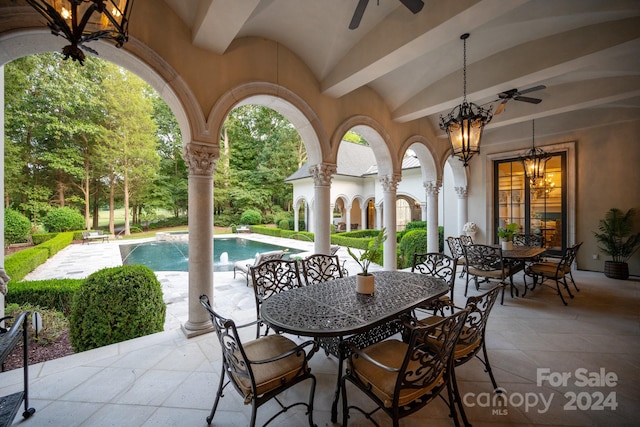 view of patio / terrace featuring ceiling fan