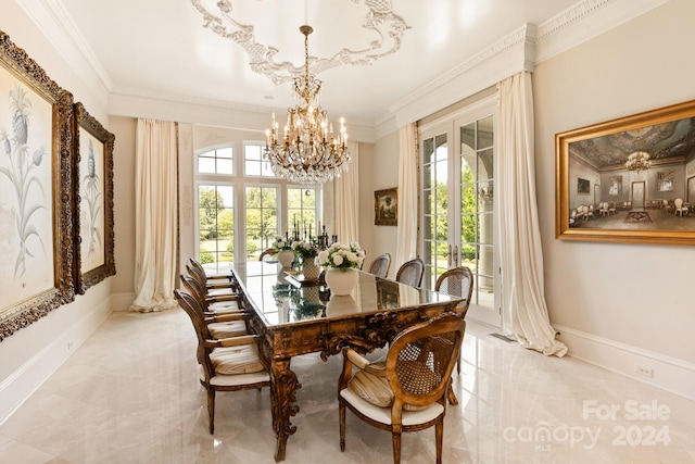 dining room with baseboards, marble finish floor, an inviting chandelier, and ornamental molding