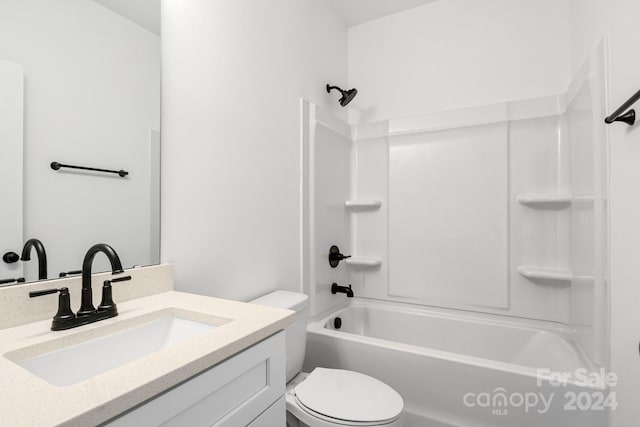 bathroom with shower / bathtub combination, vanity, and toilet