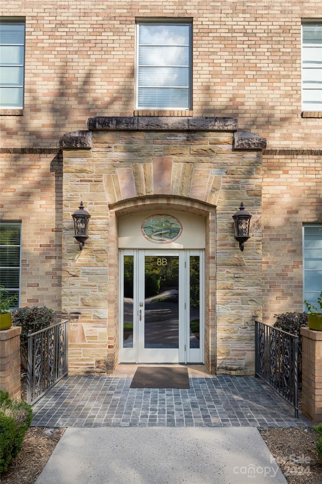 property entrance featuring french doors