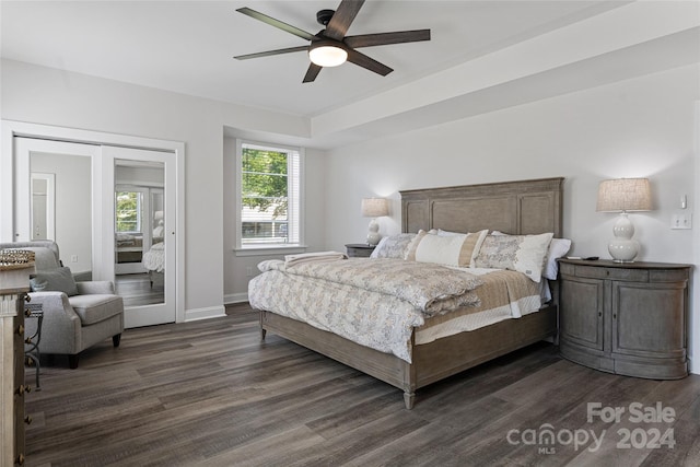 bedroom featuring dark wood-type flooring and ceiling fan