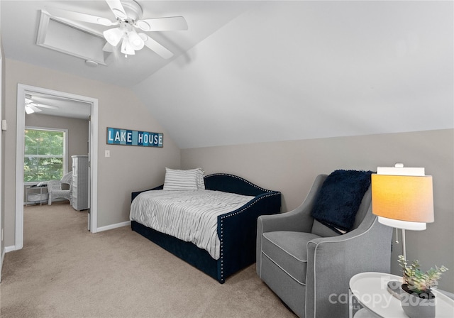 carpeted bedroom featuring vaulted ceiling and ceiling fan