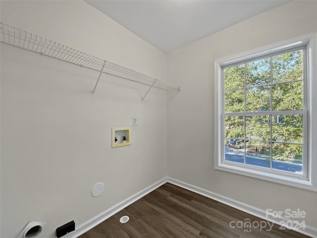 laundry room featuring a healthy amount of sunlight, laundry area, hookup for a washing machine, and baseboards