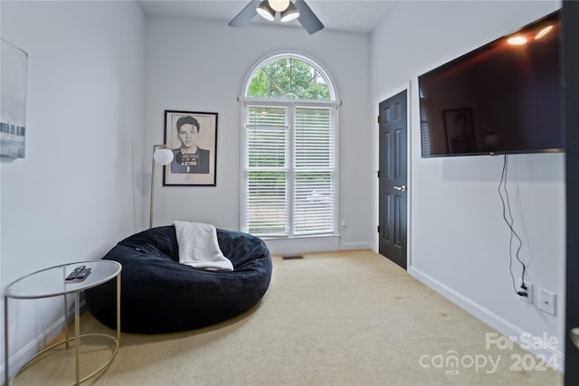 10235 Mount Holly Rd, Charlotte, NC 28214 - sitting room featuring light carpet and ceiling fan