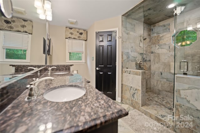 10235 Mount Holly Rd, Charlotte, NC 28214 - bathroom featuring a shower with door and vanity