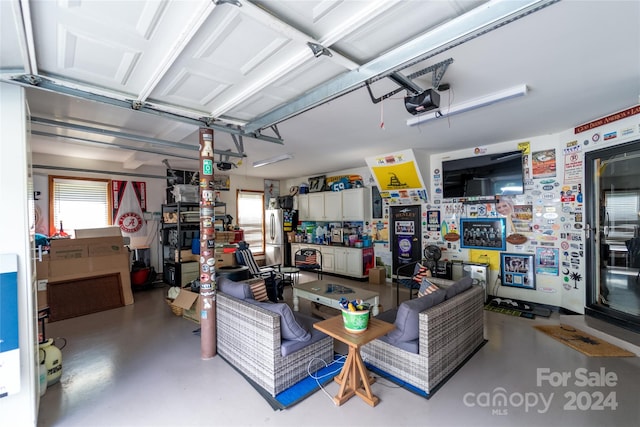 10235 Mount Holly Rd, Charlotte, NC 28214 - garage featuring stainless steel refrigerator