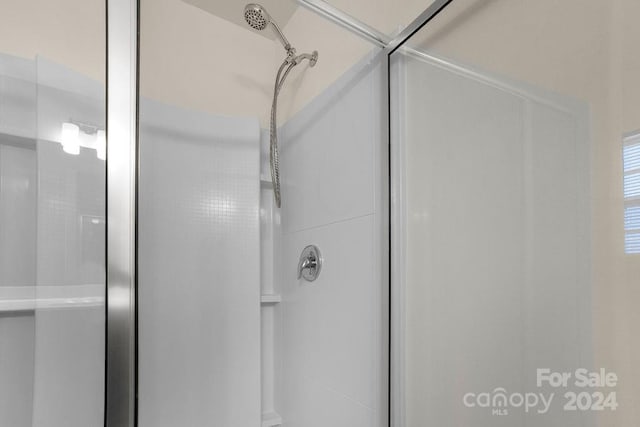 bathroom with walk in shower