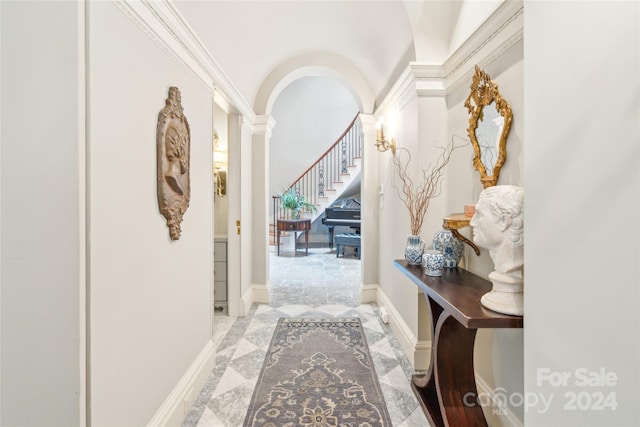 corridor featuring ornamental molding