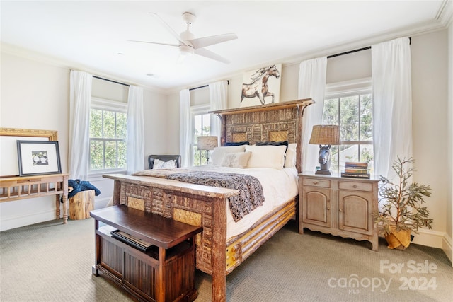 bedroom with light colored carpet, ceiling fan, and ornamental molding