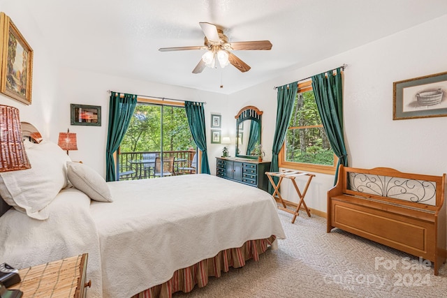 bedroom featuring carpet flooring, baseboards, a ceiling fan, and access to outside