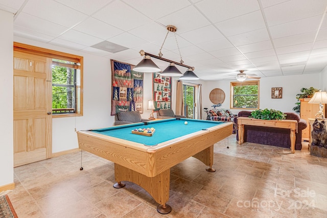 rec room featuring a drop ceiling, a healthy amount of sunlight, billiards, and baseboards