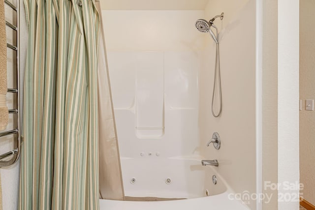 bathroom featuring a combined bath / shower with jetted tub