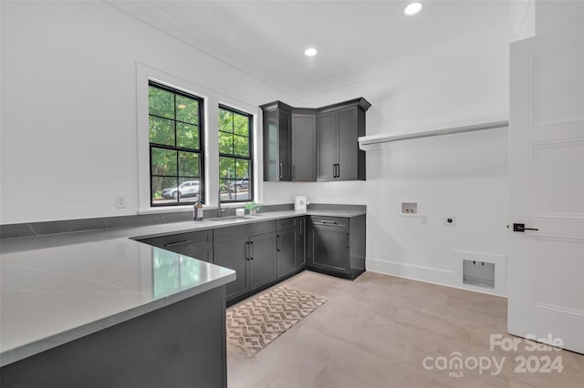 kitchen with gray cabinetry and sink