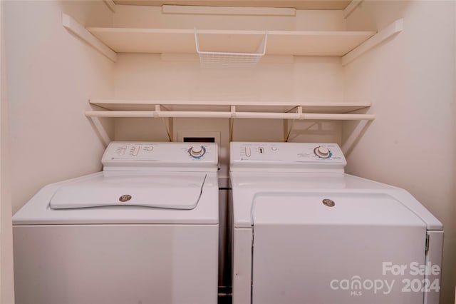 laundry area featuring washing machine and dryer