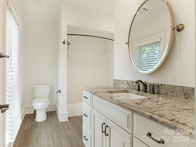 1218 Wareham Ct, Charlotte, NC 28207 - bathroom with vanity, toilet, ornamental molding, shower / tub combination, and wood finished floors
