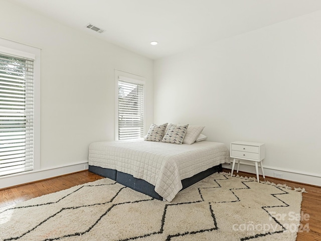 bedroom featuring hardwood / wood-style floors