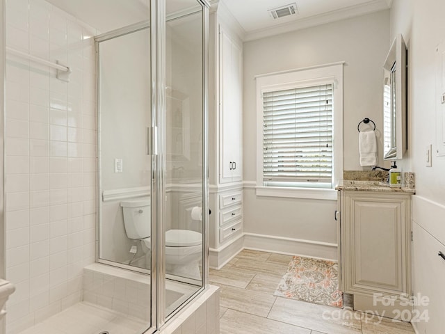 1218 Wareham Ct, Charlotte, NC 28207 - bathroom with a stall shower, vanity, toilet, and ornamental molding