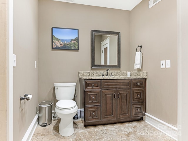 1218 Wareham Ct, Charlotte, NC 28207 - bathroom featuring baseboards, toilet, and vanity