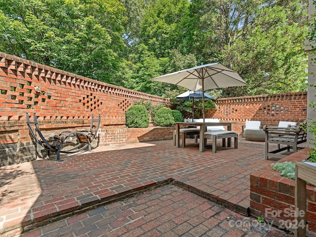 1218 Wareham Ct, Charlotte, NC 28207 - view of patio / terrace featuring outdoor dining area