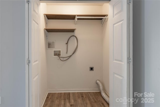 laundry area with visible vents, laundry area, hookup for a washing machine, wood finished floors, and hookup for an electric dryer