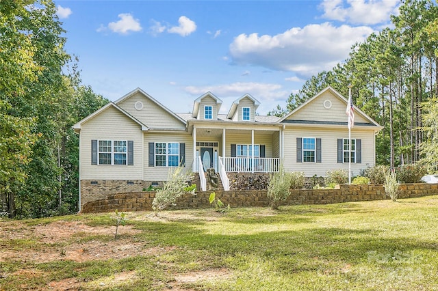 view of front of house featuring a front lawn and a porch