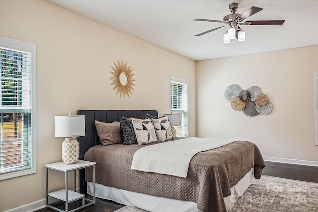 bedroom featuring wood-type flooring and ceiling fan