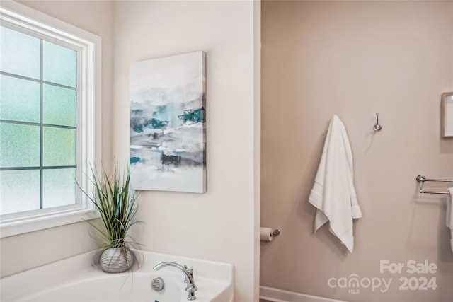 bathroom with a washtub