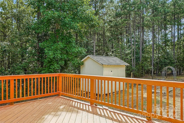 wooden terrace with a storage unit