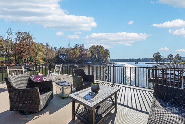 view of patio / terrace featuring a water view