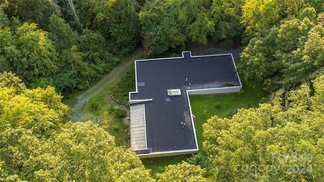 aerial view with a wooded view