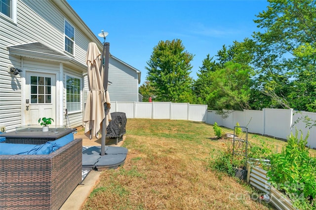 view of yard featuring a fenced backyard